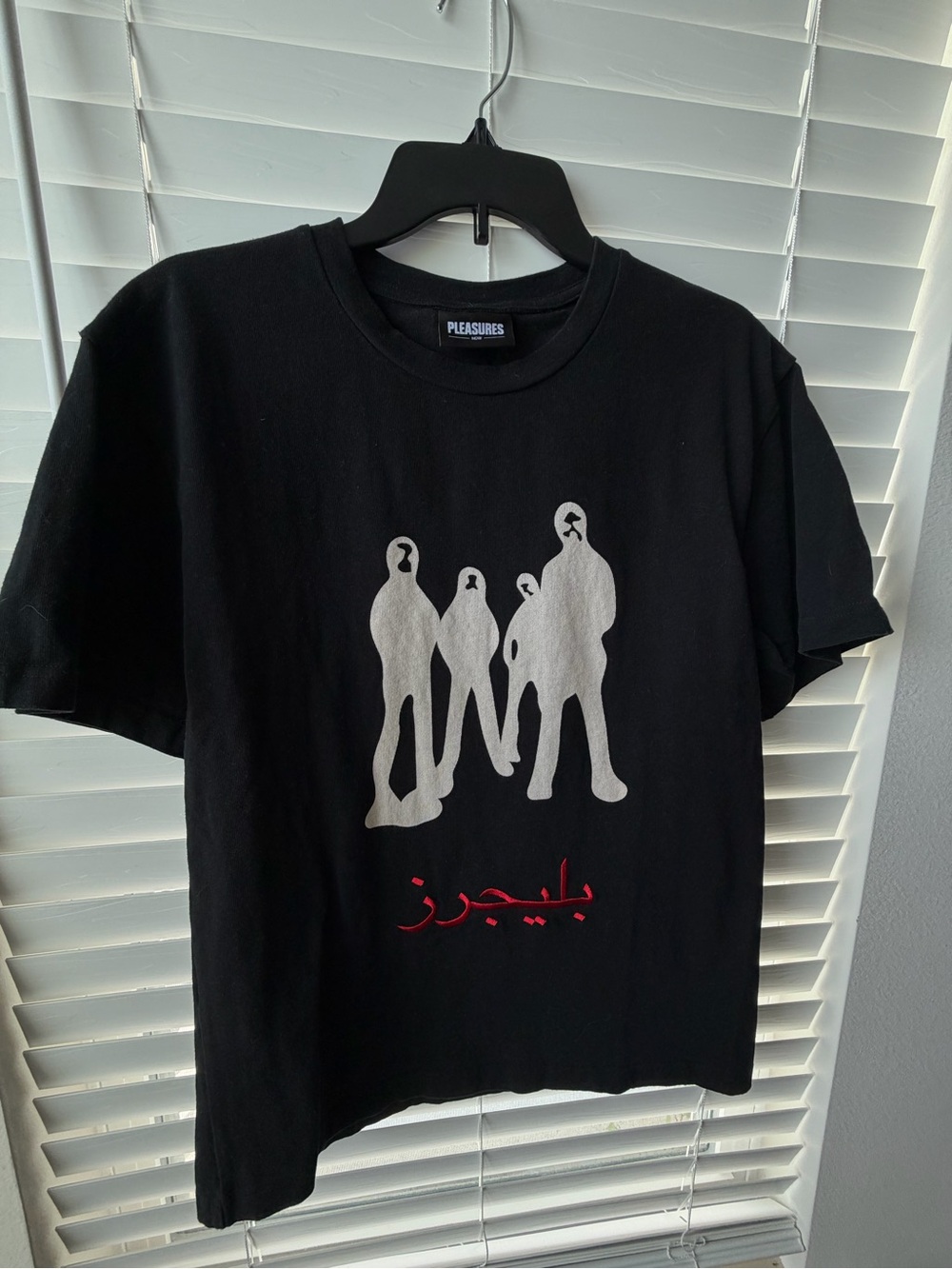 Pleasures Black Short Sleeve Tee with Red Arabic & Silver Graphic and Red Script